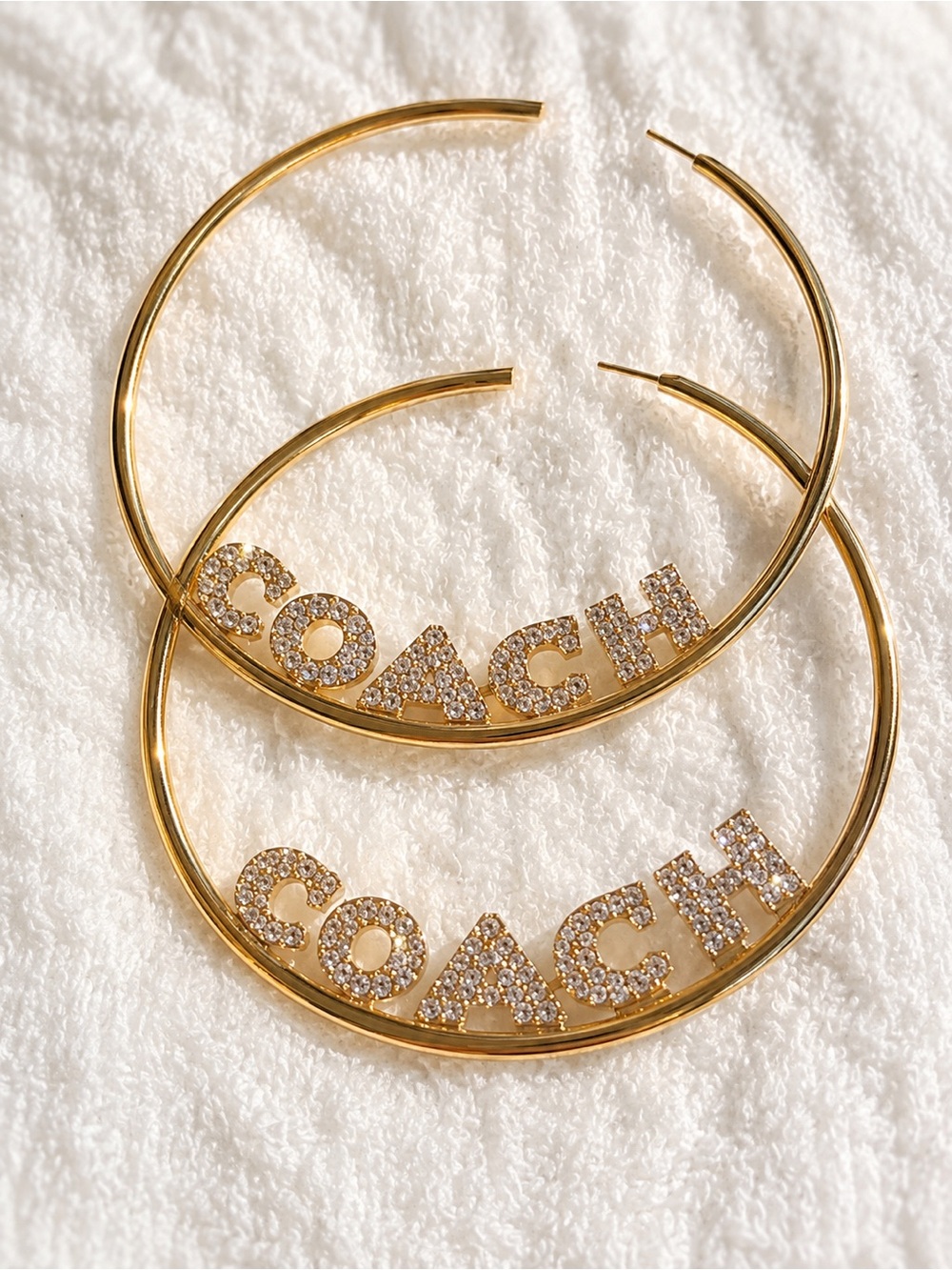 Coach Gold-Tone Crystal Logo Oversized Hoop Earrings - Picture 2 of 3